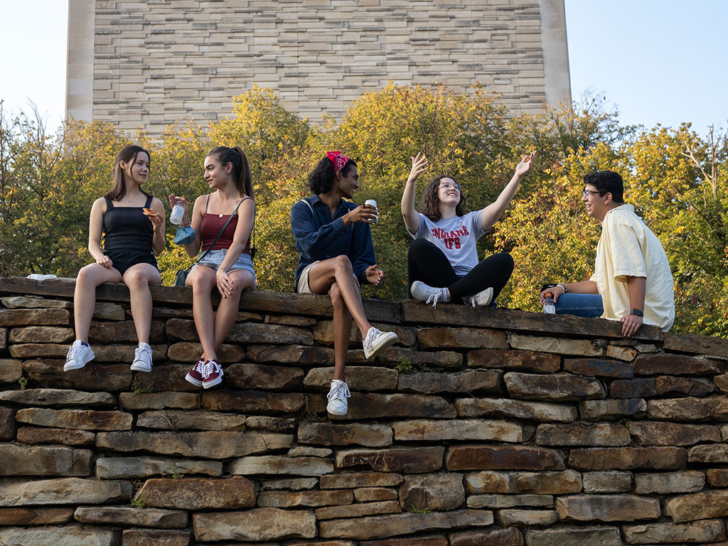 students-sitting-on-wall-in-front-of-wells-1024x768.jpg