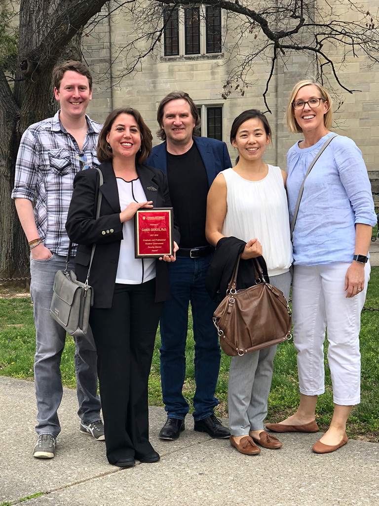 IST Ph.D. students Susan Loucks, and Mike Karlin and Janet Liao with Gamze Ozogul (second from left) and Thomas Brush (center)