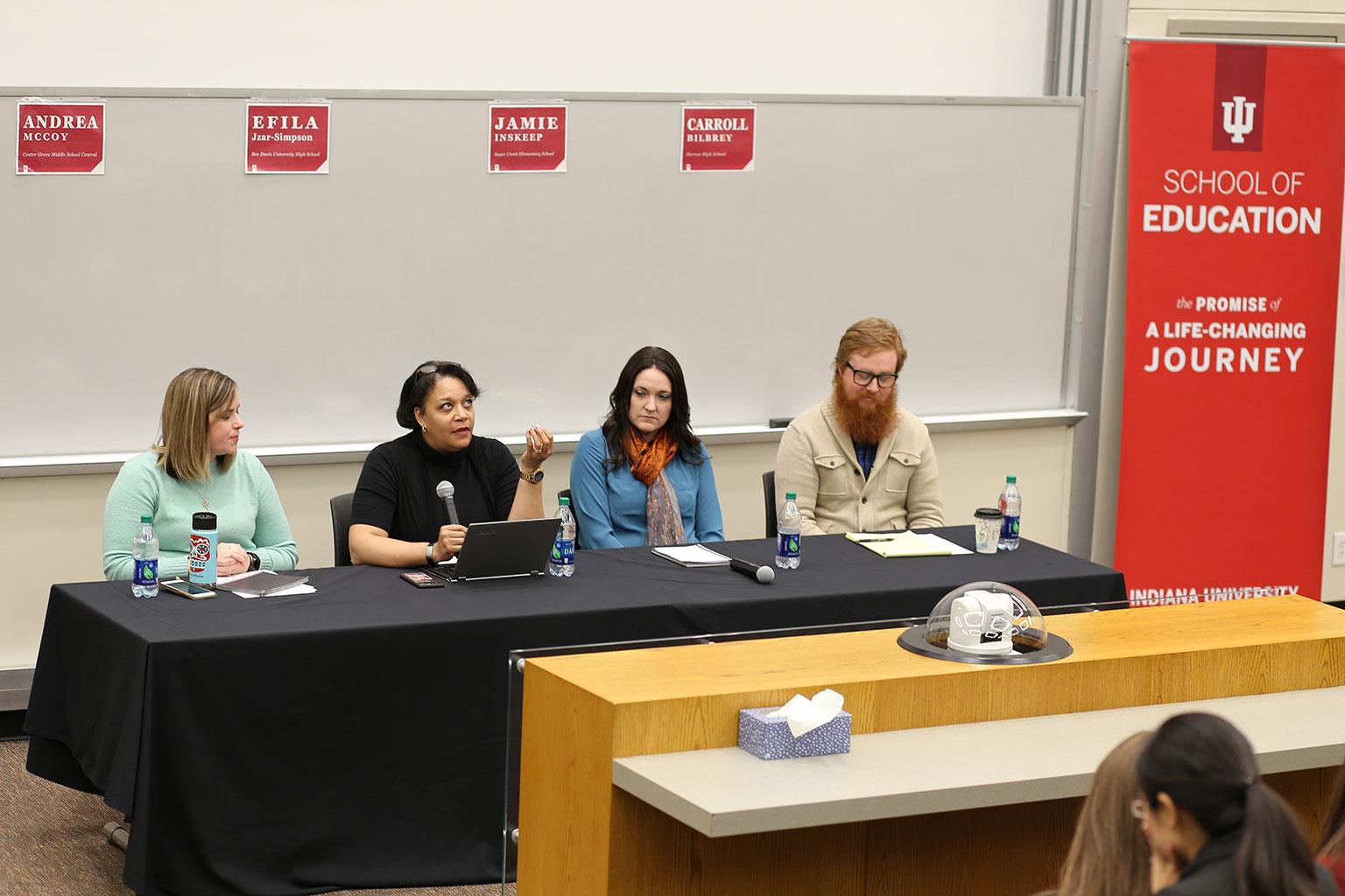 Efila Jzar-Simpson, second from left, discusses her experiences teaching during the spring semester Armstrong panel