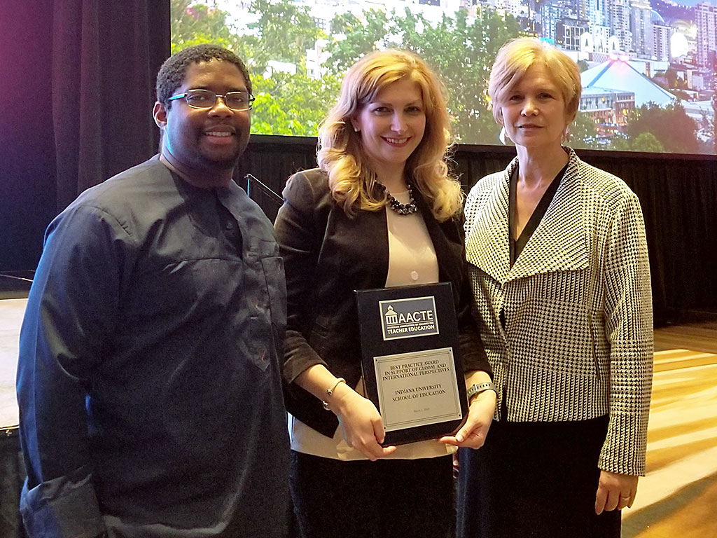 Vesna Dimitrieska, center, after she received her award with Carl Darnell, Interim Assistant Dean of Diversity, Equity and Inclusion, left, and Gayle Buck, Associate Dean of Research, right