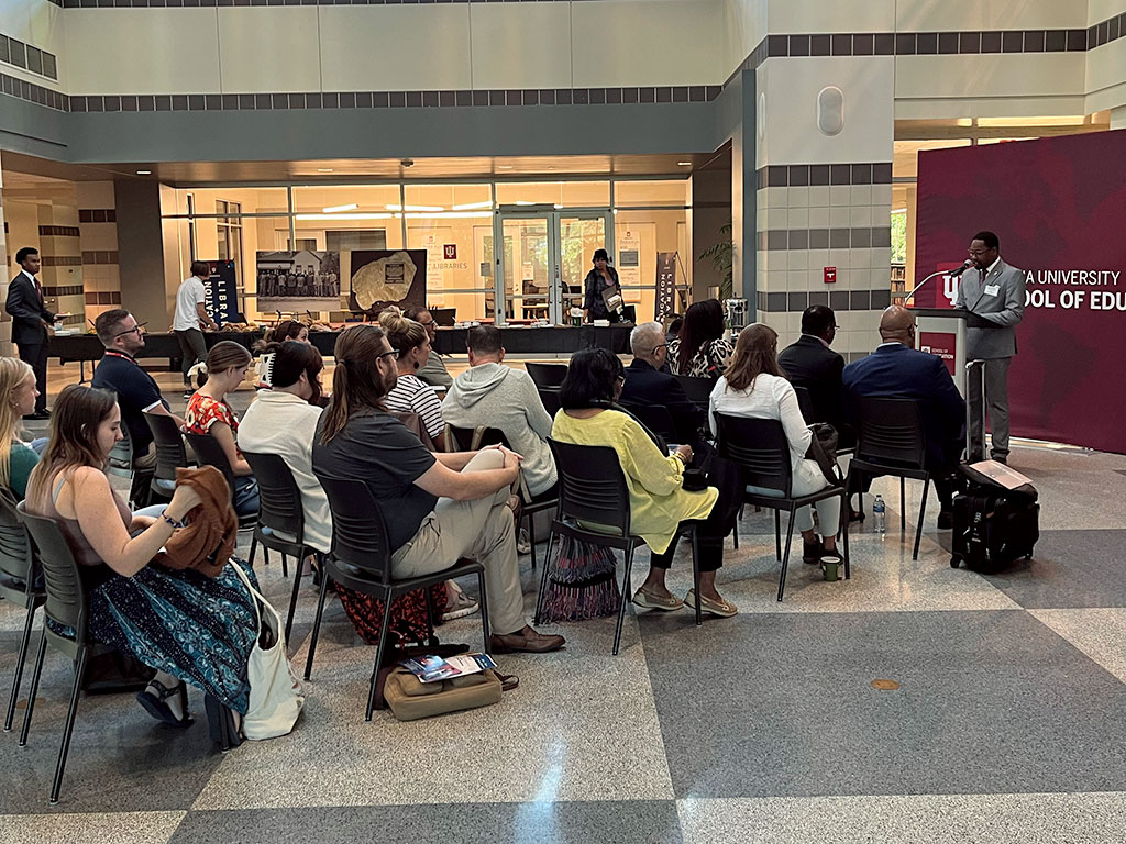 Ph.D. student and symposium organizer JC Campbell kicks off the Elder Watson Diggs Symposium