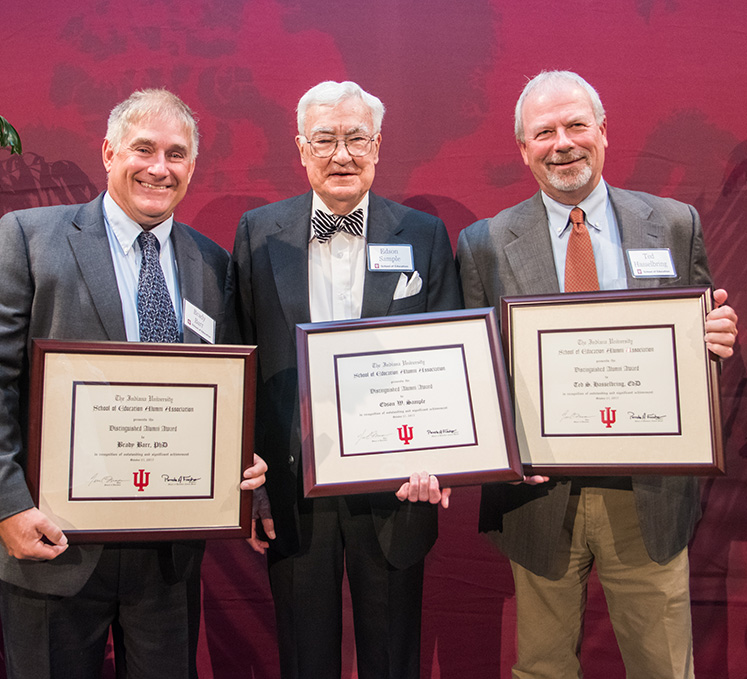 School of Education Distinguished Alumni Award winners, from left, Brady Barr, Edson W. Sample and Ted S. Hasselbring. Saisuree Chutikul was not present at the ceremony; Peter Boonjarern, president of the IU Thailand Alumni Association, presented her award in Thailand.
