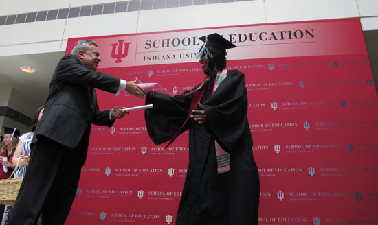 Student receiving diploma
