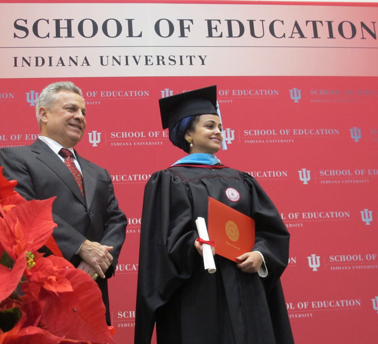 Dean Gerardo Gonzalez (left) with Sara Albadi, who received her master's degree in art education during the IU School of Education convocation ceremony on Dec. 15, 2012.