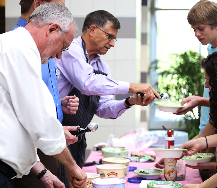 School of Education deans serve ice cream to INSPIRE Living Learning Center students as part of welcome week 2015