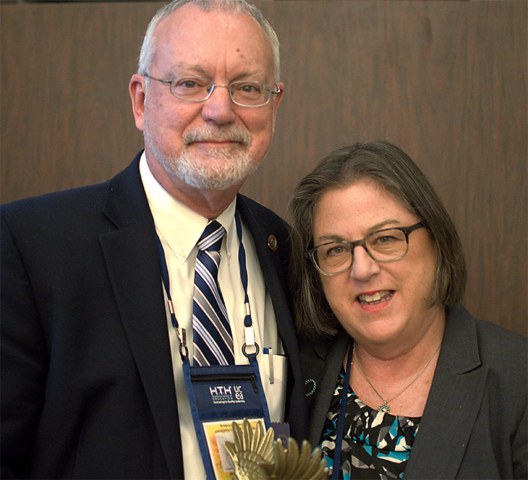 Mary Driscoll presented award winner Gary M. Crow with the 2015 Roald F. Campbell Lifetime Achievement Award
