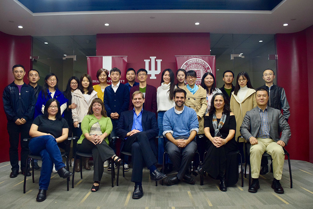 School of Education faculty with symposium participants in Beijing