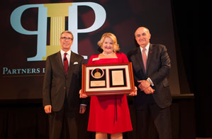 From left, IU Foundation President and CEO Daniel C. Smith, Jamia Jacobsen, and IU President Michael McRobbie.