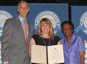 During last June's White House ceremony, US Secretary of Education Arne Duncan with IU School of Educaiton alumna Stacy McCormack, and Deputy Director of the National Science Foundation Cora Marlett in Washington, D.C.