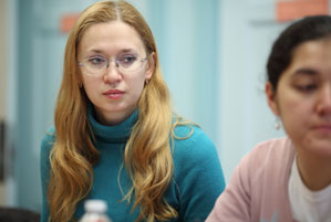 Olga Us of Vladivostok State University of Economics and Service listens during a session on international strategic planning at IU's East Asian Studies Center.
