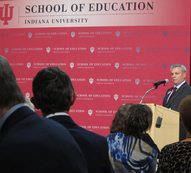 Dean Gerardo Gonzalez speaking before the IU Distinguished Alumni Awards presentation.