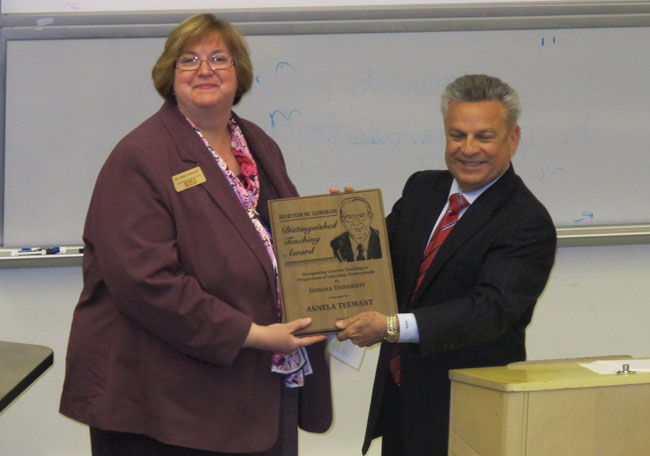 Teemant receiving the Gorman Award from Dean Gerardo Gonzalez
